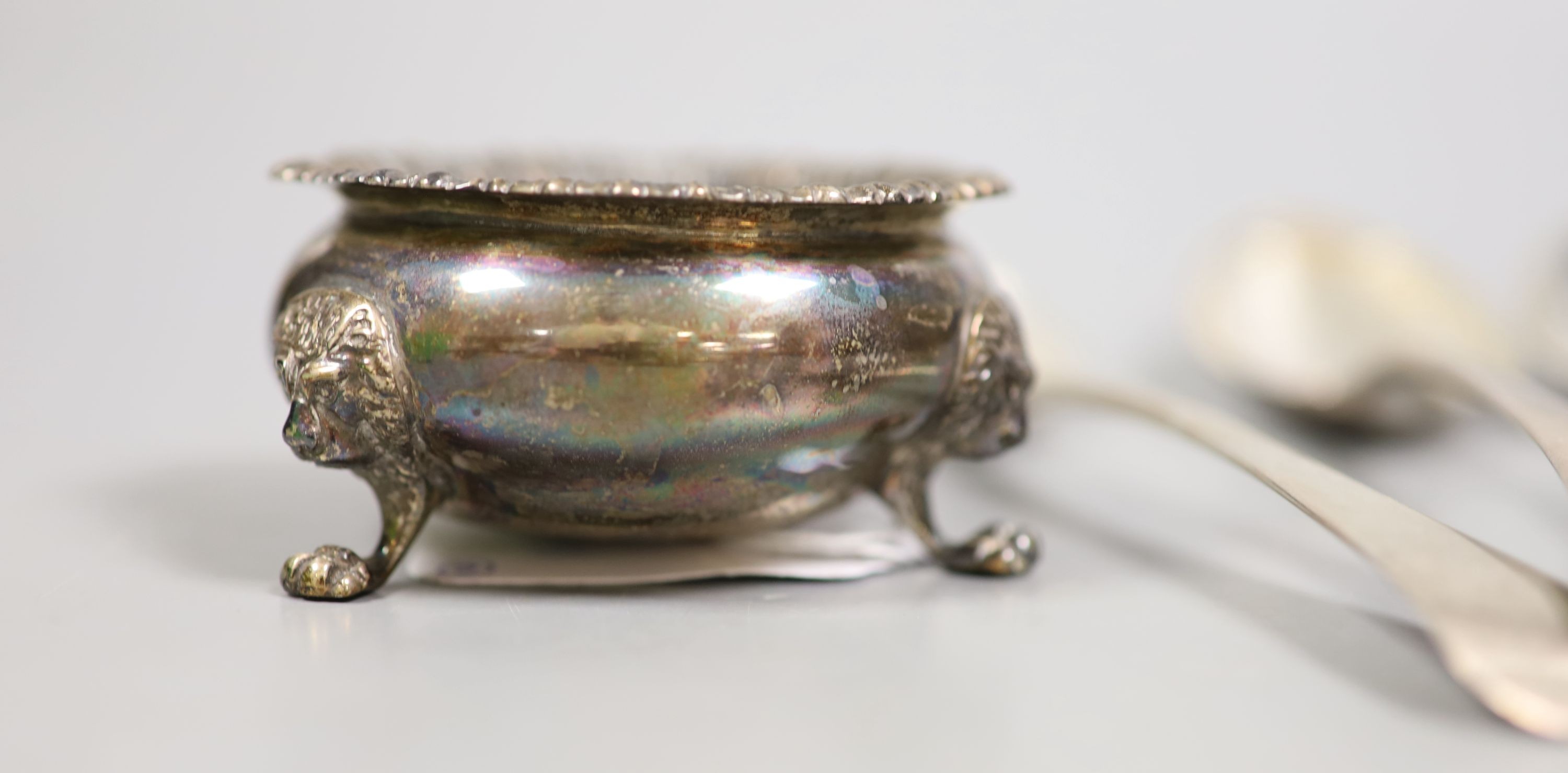 Four various George III silver Old English pattern tablespoons, a later silver salt and pair of silver sugar tongs, 11oz.